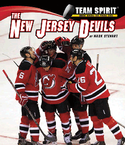 New Jersey Devils center Travis Zajac (19) checks Ottawa Senators